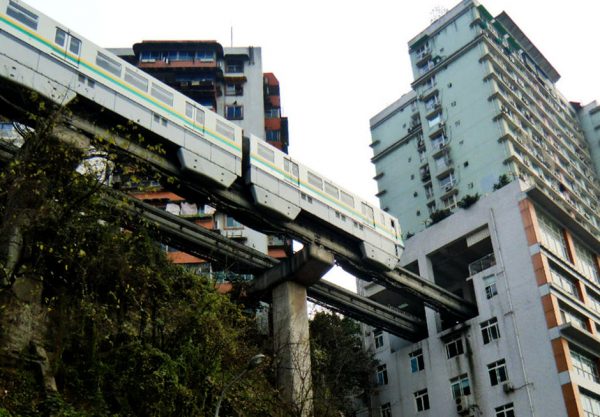 Crowded Chinese City Has Train Passing Straight Through 19-Floor Residential Building