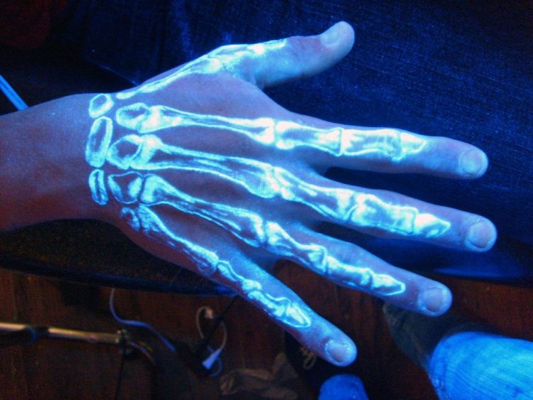 tattoos with turquoise and black light ink
